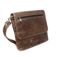 Load image into Gallery viewer, DayTrekr Distressed Leather Slim Crossbody Tablet Messenger - Brown
Image of Front Angled View. Showing Matching Leather adjustable strap that can be worn across the shoulder or crossbody as preferred.
Dimensions: 11.5 x 10 x 1"
