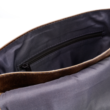 Load image into Gallery viewer, DayTrekr Distressed Leather Slim Crossbody Tablet Messenger - Brown
Image of main interior compartment with zippered pocket against front facing wall.
Dimensions: 11.5 x 10 x 1