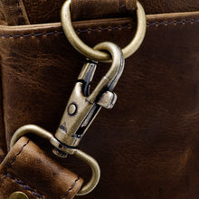 Load image into Gallery viewer, DayTrekr Distressed Leather Slim Crossbody Tablet Messenger - Brown
Close up image of Antique Brass Hardware.
Dimensions: 11.5 x 10 x 1