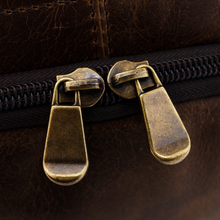 Load image into Gallery viewer, DayTrekr Hanging Toiletry Kit - Brown Distressed Leather
Close-up view of Antique Brass Hardware
Dimensions: 11"(w) x 9"(h) x 4"(d)