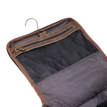Load image into Gallery viewer, DayTrekr Hanging Toiletry Kit - Brown Distressed Leather
Close-up view of interior top mesh zippered pocket.
Dimensions: 11"(w) x 9"(h) x 4"(d)