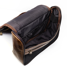 Load image into Gallery viewer, DayTrekr Hanging Toiletry Kit - Brown Distressed Leather
Angled View of Main Compartment with elasticized pocket on back interior wall, elastic straps on side panel for toothbrush and razor. As well as ample space for the rest of your toiletries.
Dimensions: 11"(w) x 9"(h) x 4"(d)