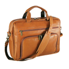 Load image into Gallery viewer, Angled front view of the tan briefcase. The removable shoulder strap is resting across it.