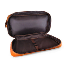 Load image into Gallery viewer, Interior view of the bottom compartment on the tan leather duffle bag. It feature an adjustable strap to hold contents.