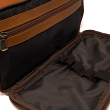 Load image into Gallery viewer, DayTrekr Leather Organizer Travel Kit - Tan
Image of Front Zip-Around Pocket with close up view of mesh zippered pocket, antique brass hardware and leather reinforcement around zip pocket for top-quality strength and construction.
Dimensions: 12" x 6" x 5"