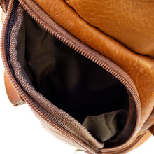 Load image into Gallery viewer, DayTrekr Leather Summit Backpack - Tan
Image of Side Panel Pocket with nylon gusset for extra protection from spilling contents when unzipped.
Dimensions: 18"h x 13"w x 7"d