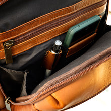 Load image into Gallery viewer, DayTrekr Leather Summit Backpack - Tan
Image of Front Panel Business Organizer for quick access to your smart phone, pen, as well as zippered pocket for passport, ticket, etc.
Dimensions: 18"h x 13"w x 7"d