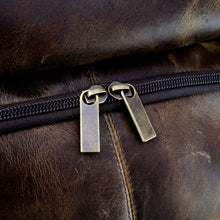 Load image into Gallery viewer, DayTrekr Distressed Leather Bombardier Backpack - Brown
Image on antique zippers and hardware.
Dimensions: 18"h x 13"w x 7"d