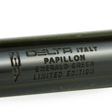 Load image into Gallery viewer, Close up to the engraved pen barrel with Delta logo and text: PAPILLON EMERALD GREEN LIMITED EDITION.
