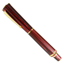 Load image into Gallery viewer, Side view of the fountain pen with the cap on.