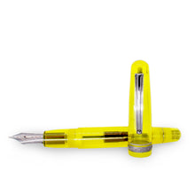 Load image into Gallery viewer, The fountain pen with the cap removed and set on front.