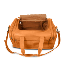 Load image into Gallery viewer, Angled top view of the tan leather duffle bag with the top lid unzipped and flipped back.