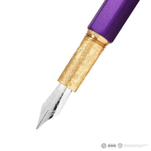 Load image into Gallery viewer, Angled front view of the fountain pen nib and grip section