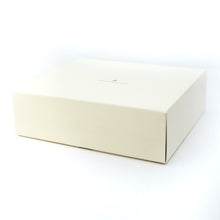 Load image into Gallery viewer, White rectangular outer box on a white background.