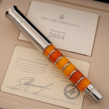 Load image into Gallery viewer, Graf von Faber-Castell pen with a certificate of authenticity on a beige background.