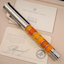 Load image into Gallery viewer, Graf von Faber-Castell pen with a certificate of authenticity on a beige background.