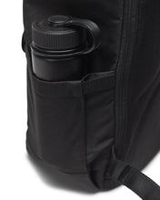 Load image into Gallery viewer, Close up to a water bottle tucked inside the side panel's pocket.