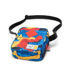 Load image into Gallery viewer, Angled view of the crossbody bag on a white background.