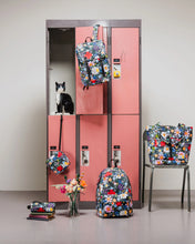 Load image into Gallery viewer, Floral-patterned bags arranged with a set of pink lockers and a Lego cat.