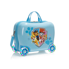 Load image into Gallery viewer, Angled front view of the blue Paw Patrol wheeled suitcase for children.