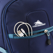Load image into Gallery viewer, Close up to the front panel pocket with a cellphone USB cable peeking out.