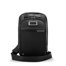 Load image into Gallery viewer, Briggs & Riley @work Sling shown in Black
Front Panel View showing adjustment feature on matching webbed nylon strap.
Dimensions:  13 x 8.5 x 4 in / 33 x 21.6 x 10.2 cm