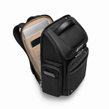 Load image into Gallery viewer, Briggs & Riley @Work Medium Widemouth Backpack in Black
Image of Front Panel Angled View - back panel compartment showing protected areas for your laptop and tablet.
 
Dimensions: 17 x 14.5 x 8 in / 43.2 x 36.8 x 20.3 cm