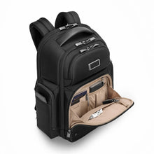 Load image into Gallery viewer, Briggs & Riley @Work Large Cargo Backpack in Black
Image of Angled Front Panel View with front organizer pocket for passport, tickets, pens, keys, cards, and charger cables.
Dimensions: 18.75 x 16 x 8.75 in / 47.6 x 40.6 x 22.2 cm