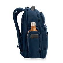 Load image into Gallery viewer, Briggs & Riley @Work Large Cargo Backpack in Navy
Image of Side Panel view with hydration pocket for water bottle or travel thermos.
Dimensions: 18.75 x 16 x 8.75 in / 47.6 x 40.6 x 22.2 cm