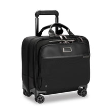 Load image into Gallery viewer, Angled front view of the black spinner brief. The telescopic handle is pulled part way up.