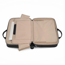 Load image into Gallery viewer, Interior view of the spinner brief  with the zipper compartments closed.