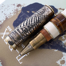 Load image into Gallery viewer, Close up to the pen's grip section and side of the cap.