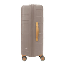 Load image into Gallery viewer, Side-view of the suitcase. The handle is in a light-tan color. Set on a white background.
