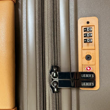 Load image into Gallery viewer, Close up to the TSA lock .The two zippers can be inserted to be locked in place.