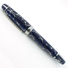 Load image into Gallery viewer, Side view of the fountain pen with the cap on