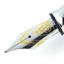 Load image into Gallery viewer, Close up to the fountain pen nib with engraved decorations, Michel Perchin logo, 18K gold hallmarks, and the letter M.