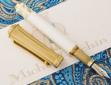 Load image into Gallery viewer, The fountain pen with the cap next to it.