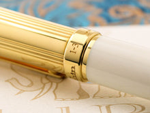 Load image into Gallery viewer, Close up to the engraved edition number on the cap ring, one of three.