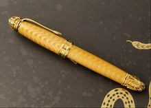 Load image into Gallery viewer, Side view of the fountain pen with the cap on.