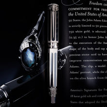 Load image into Gallery viewer, Front view of the Montblanc Signatures for Freedom John Adams Fountain Pen. Laid in the middle of between the pages of the included booklet