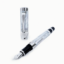 Load image into Gallery viewer, The fountain pen and cap arranged on a white background.