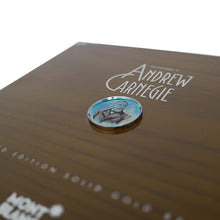 Load image into Gallery viewer, Angled close up to the lid of the presentation box with a small medal of Andrew Carnegie's portrait.