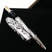 Load image into Gallery viewer, Front view of the fountain pen with the cap next to it
