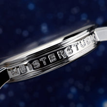 Load image into Gallery viewer, Close up to the side of the watch's case. The engraving reads: "MEISTERSTUCK".