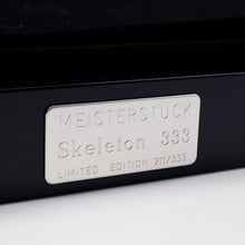 Load image into Gallery viewer, Close up to the presentation box's medal. It reads "MEISTERSTUCK, Skeleton 333 Limited Edition 211/333"