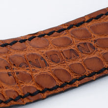 Load image into Gallery viewer, Close up to the Montblanc logo embossed on the watch band interior.