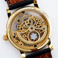 Load image into Gallery viewer, Angled back panel close up to the gold watch.
