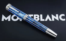 Load image into Gallery viewer, The Montblanc pen with a blue and silver striped barrel, displayed diagonally on a black background with the Montblanc logo.