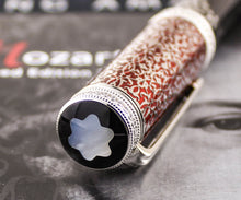 Load image into Gallery viewer, Angled close up to the top of the pen cap.