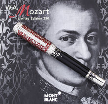 Load image into Gallery viewer, Front view of the fountain pen on top of the booklet.